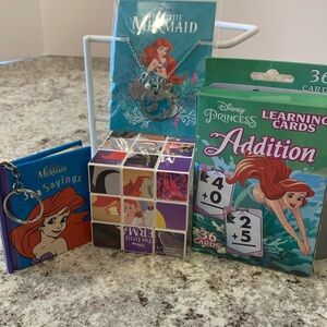 LOT Disney the little mermaid necklace, keychain book, Rubiks cube, cards